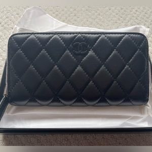 CHANEL Black Quilted Zip Around Wallet